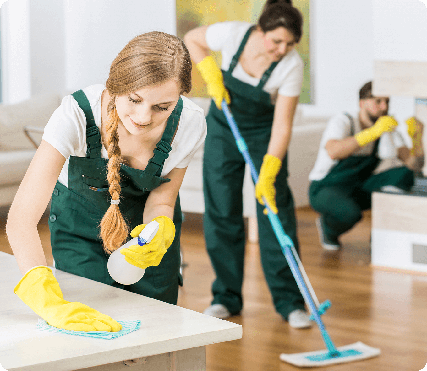 Cleaning team working in a bright room.